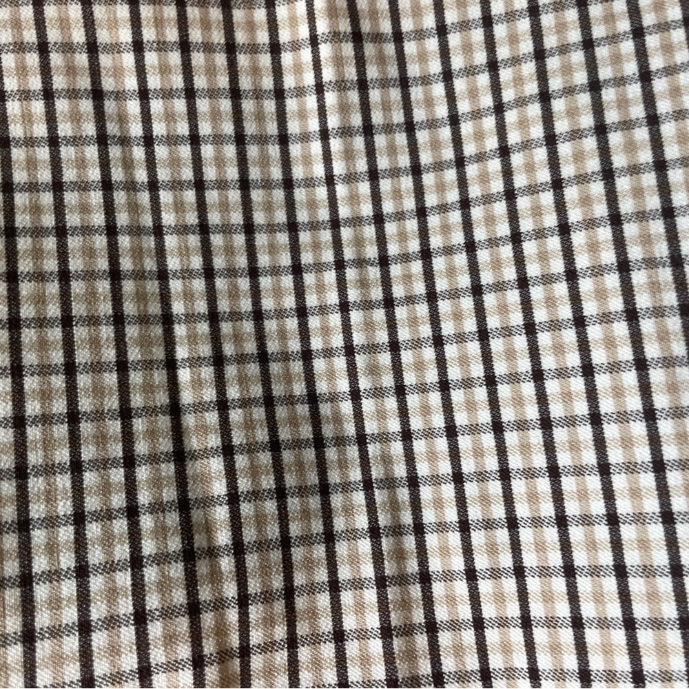 neutral checkered business pants.